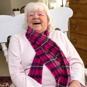 Woman laughs heartily at Vermont memory care facility
