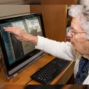 Vermont memory care resident uses computer