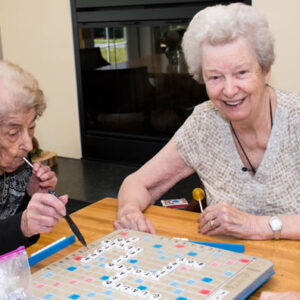 Residents of Windsor senior living center play Scrabble
