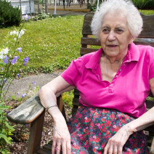 Windsor nursing home resident sits in the garden