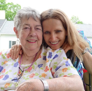 Windsor nursing home staff and resident pose together