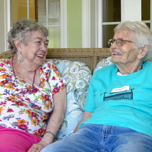 Residents smile together at retirement home in Windsor